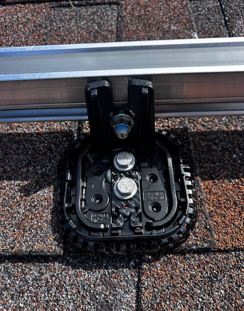InstaFlash2 roof mount close-up showing flashing and rail attachment.